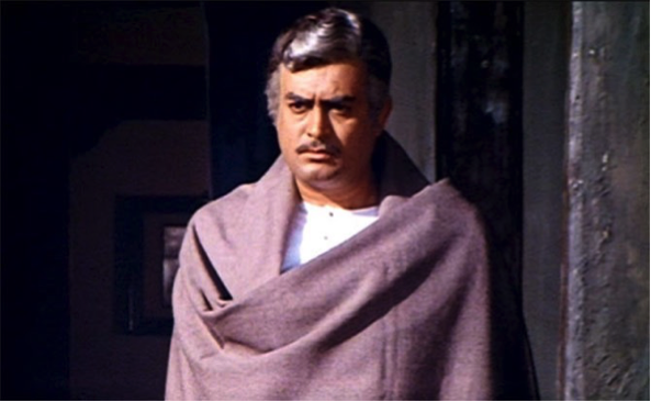 Figure 4: A still from Sholay (1975) showing Thakur in his shawl